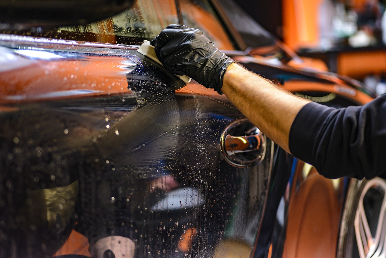 Hand-applied premium finish on glossy black vehicle