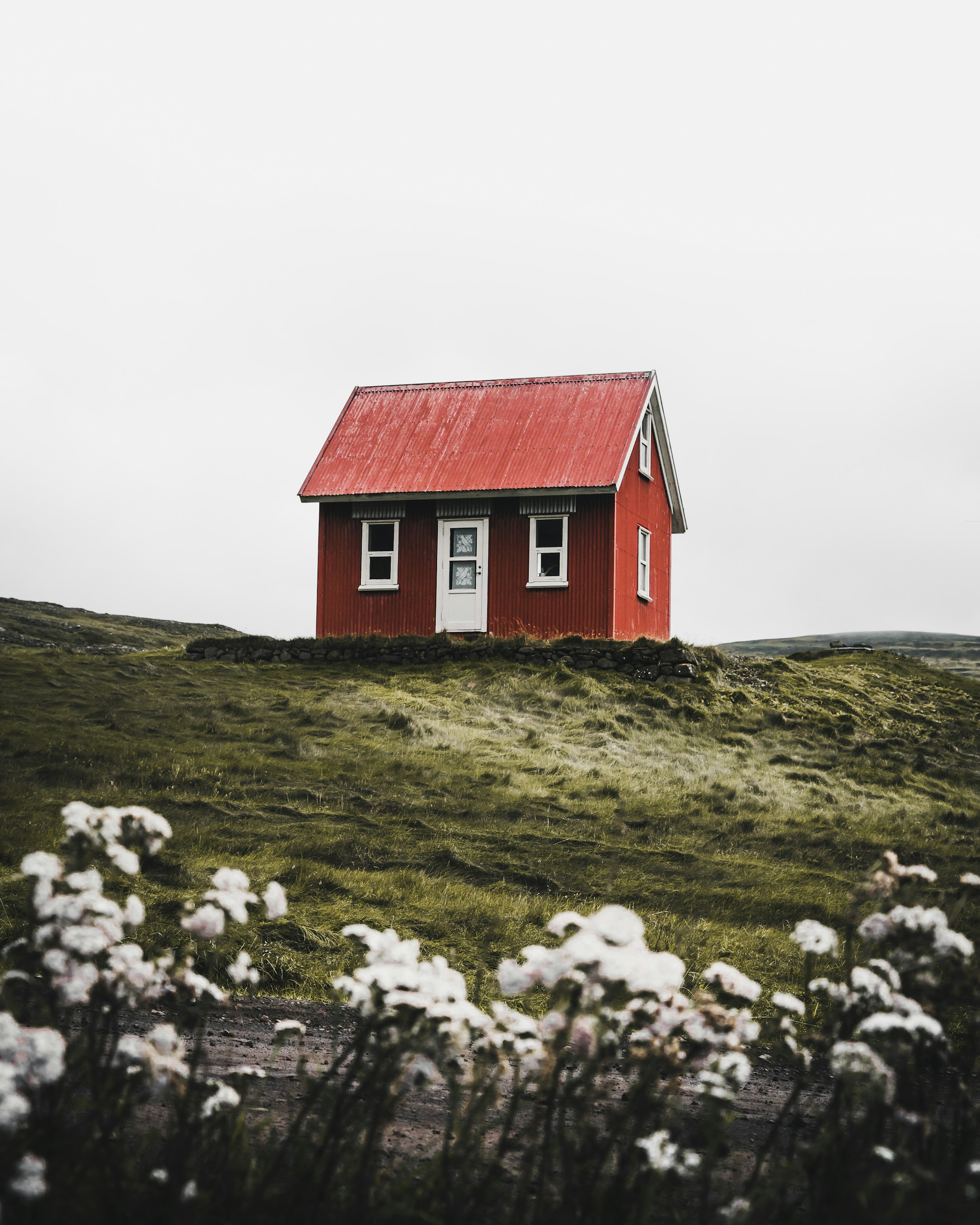 Remote guest house surrounded by an open mountain landscape