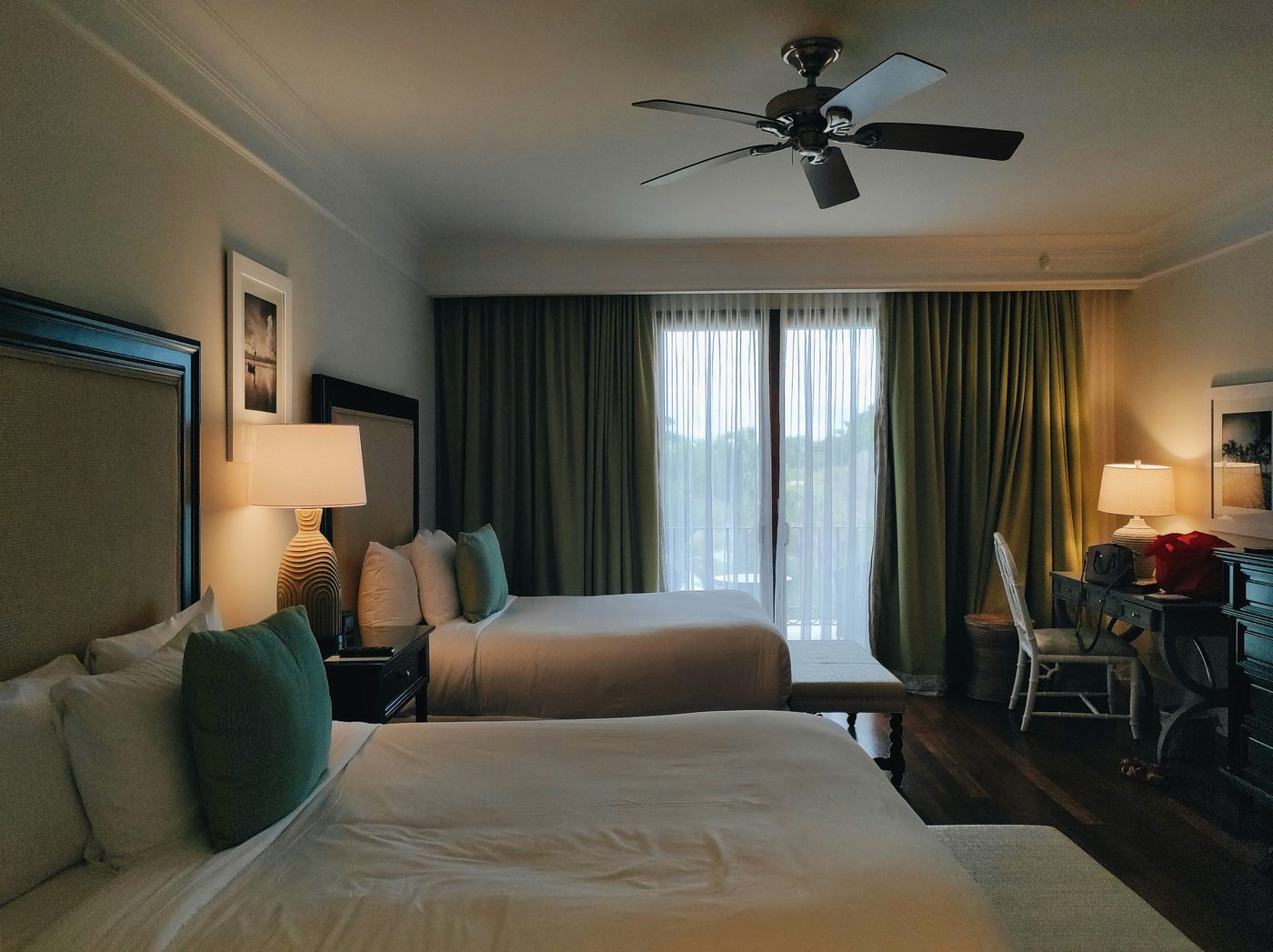 Garden Room twin beds with soft green curtains